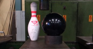 presse-hydraulique-sur-une-quille-et-boule-de-bowling